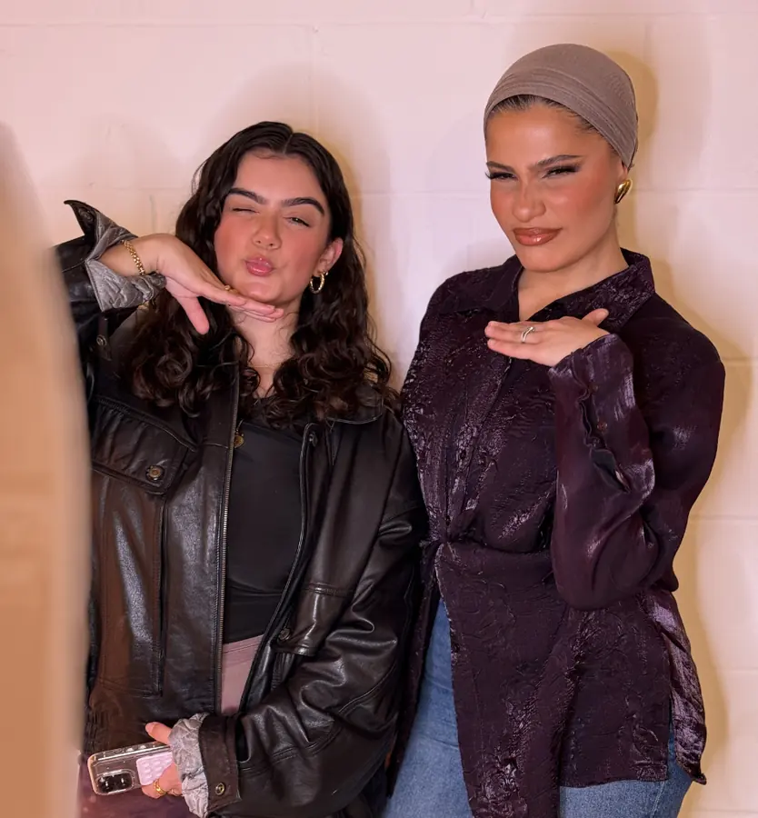 Two friends striking a pose