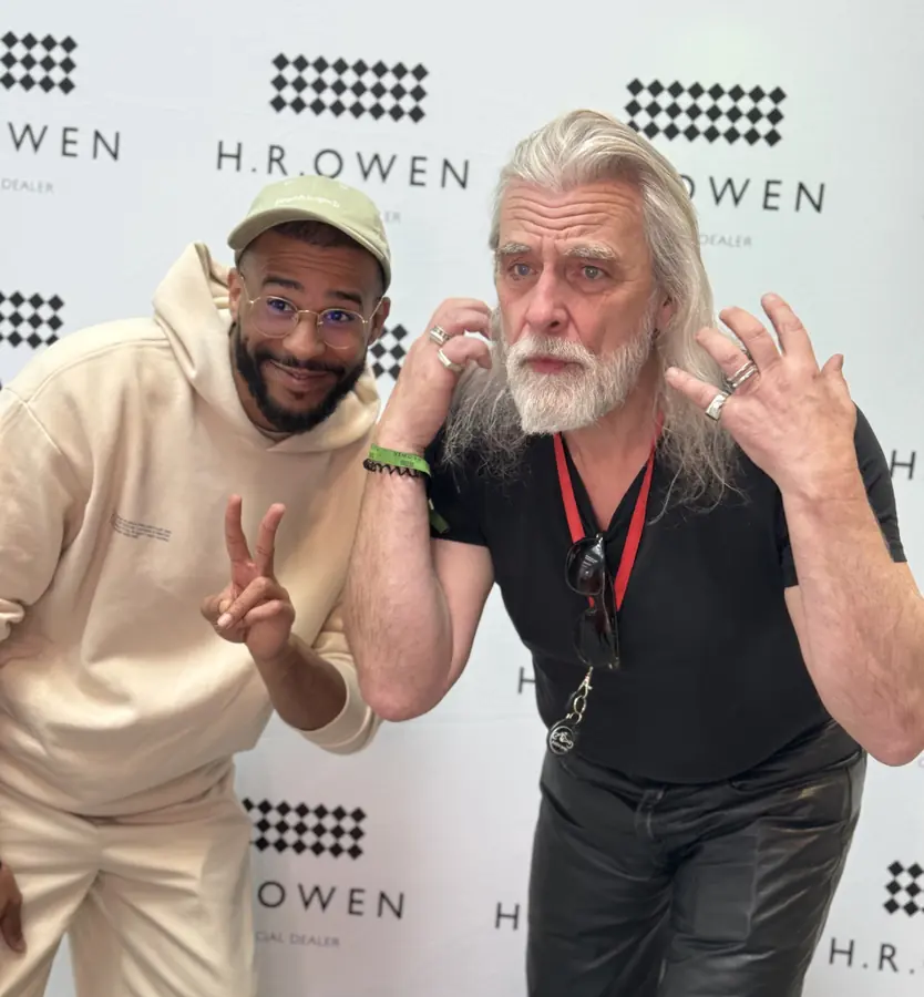 Two guests clowning around at an HR Owen event