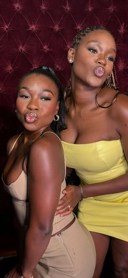 Two friends posing together